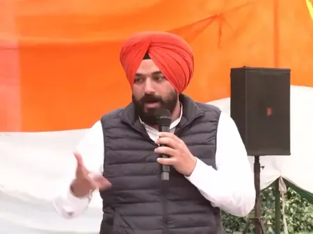 Congress Leader Challenges Modi Amid Shirtless Protest at AI Expo
