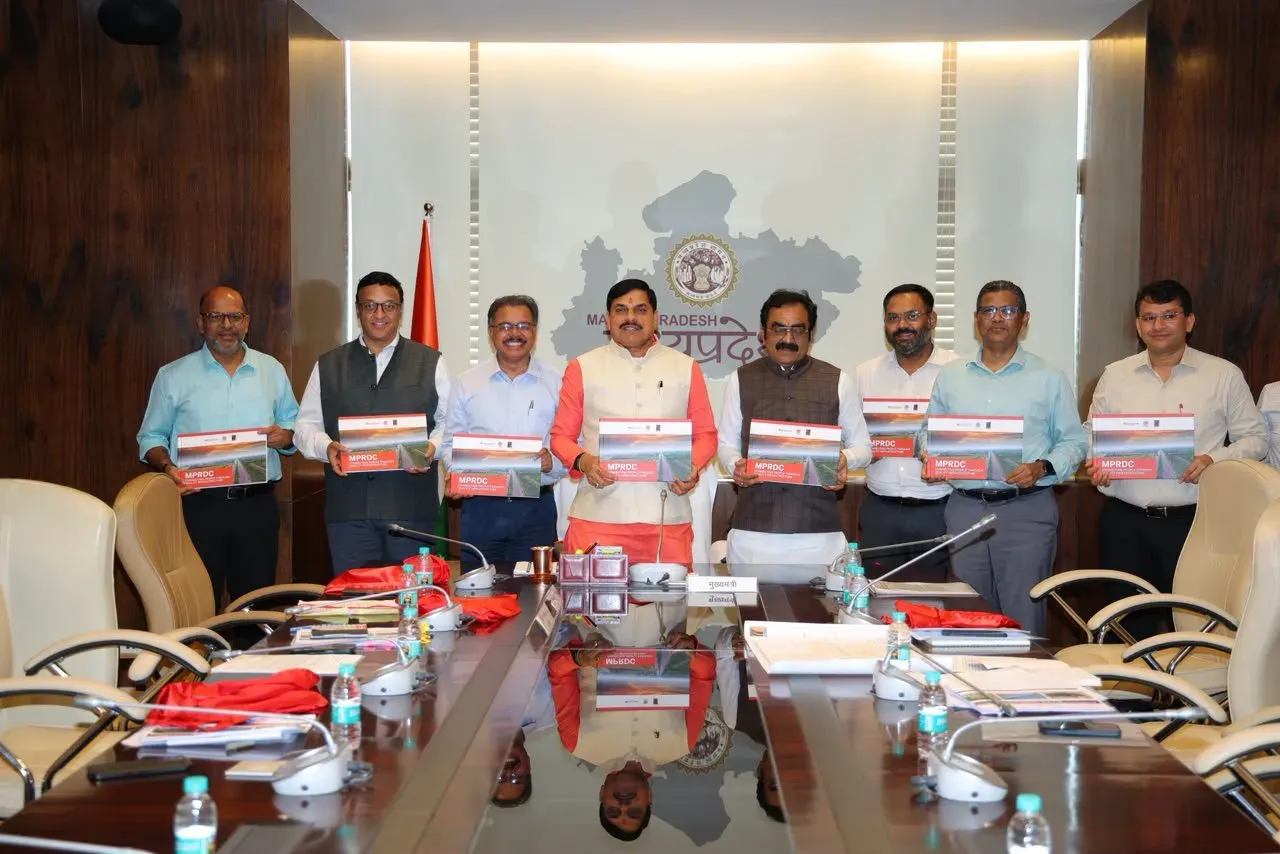 MP CM Mohan Yadav Releases MP RDC Infrastructure Coffee Table Book