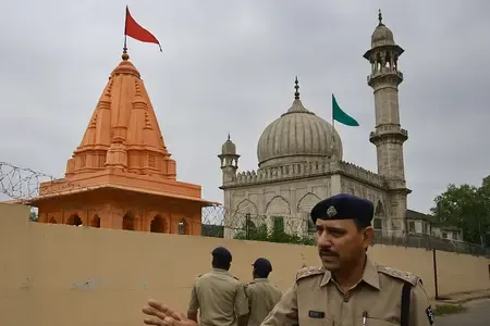 How is the MP temple-mosque dispute being managed for peace?