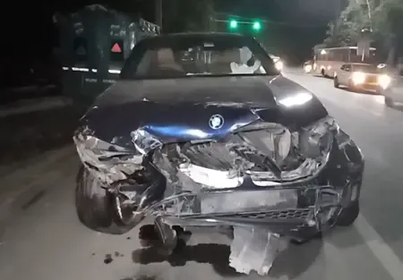 What led to Navjot's unconsciousness after BMW hit his bike?