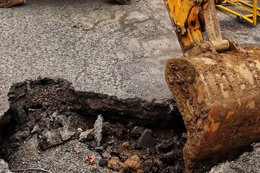 Noida Sector 73 road caves in near D-Mart site after heavy rain, probe ordered