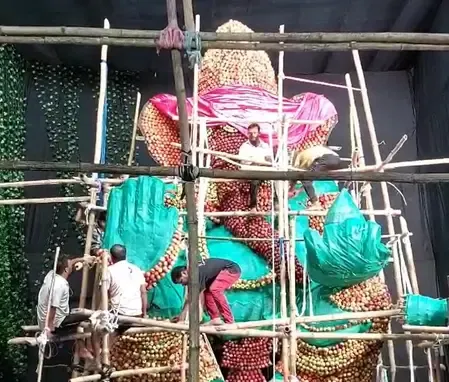 क्या ओडिशा के संबलपुर में नटराज क्लब ने गोल्डन जुबली पर 26 फुट ऊंची सेब की गणेश मूर्ति बनाई?