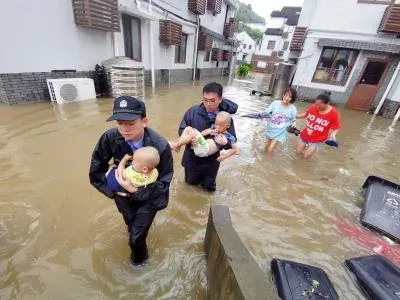 Beijing floods: 95,657 evacuated as heavy rains and twin typhoons raise flood risk