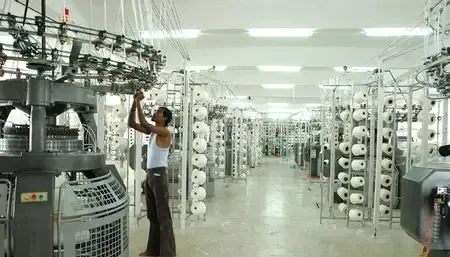 What is the new wage pact for TN's Tiruppur knitwear workers?