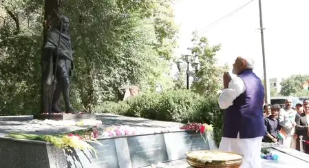 Modi pays tribute to Mahatma Gandhi in Bishkek, meets Indian community