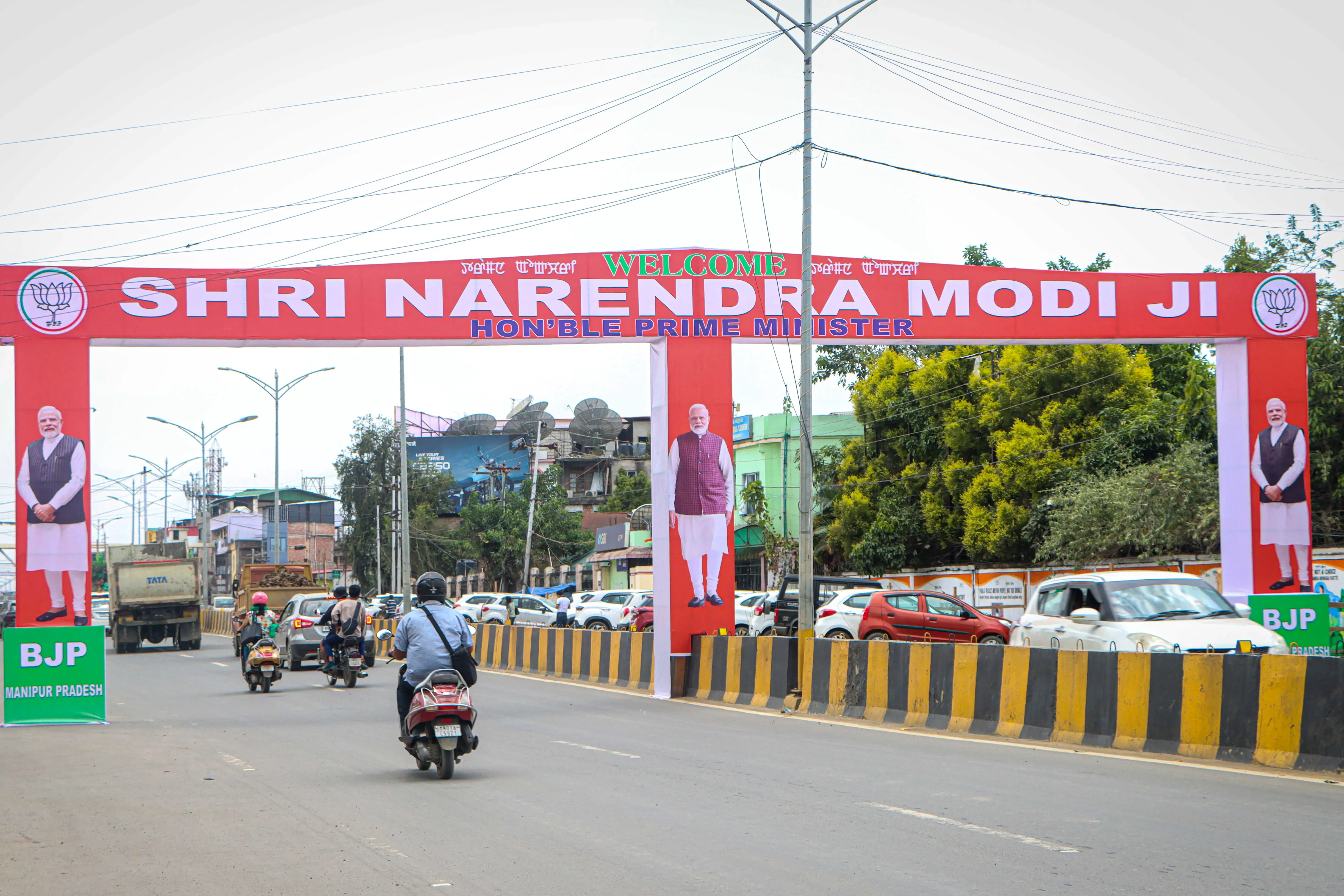 What major projects is PM Modi unveiling in Manipur tomorrow?
