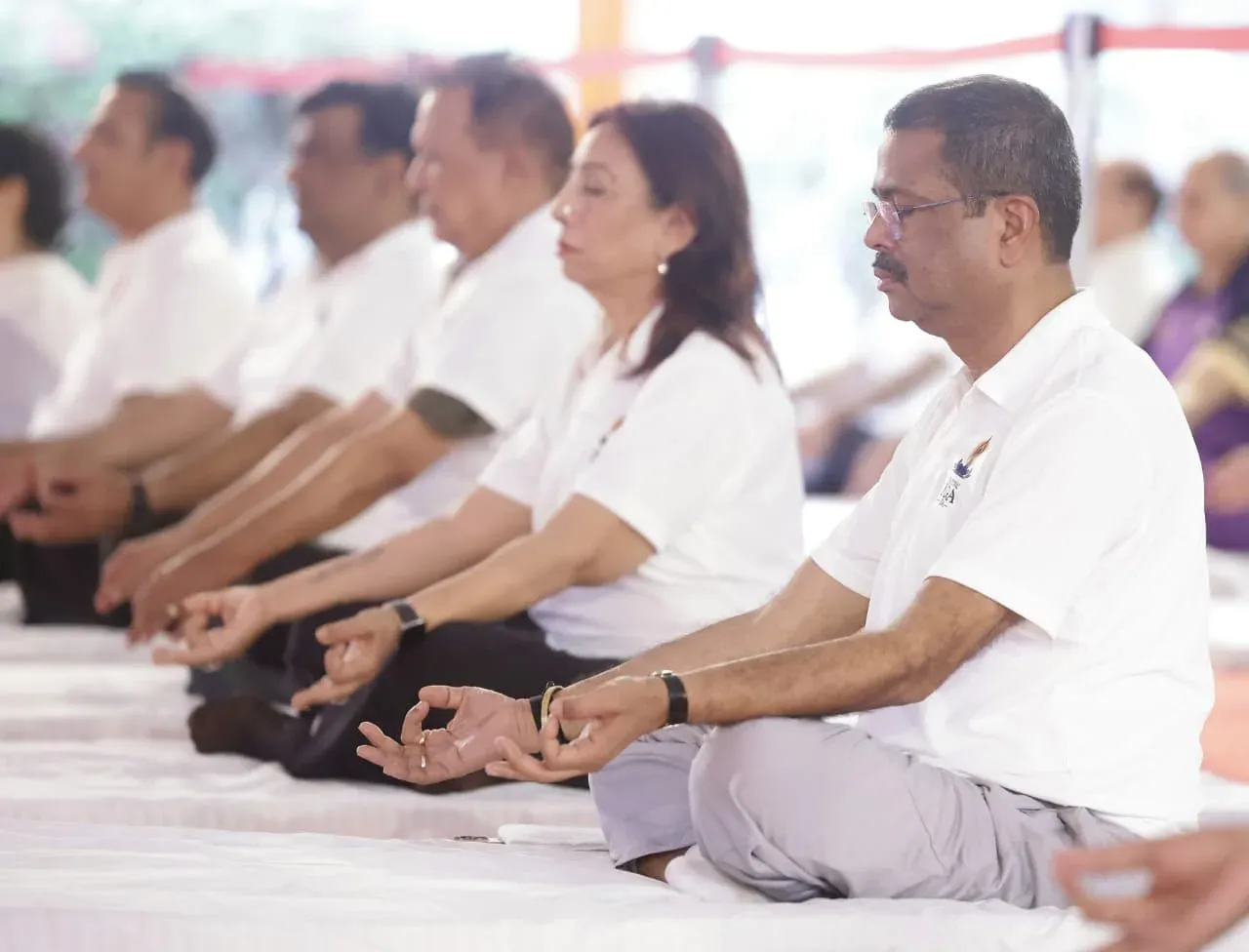 Pradhan joins yoga session at Delhi University South Campus