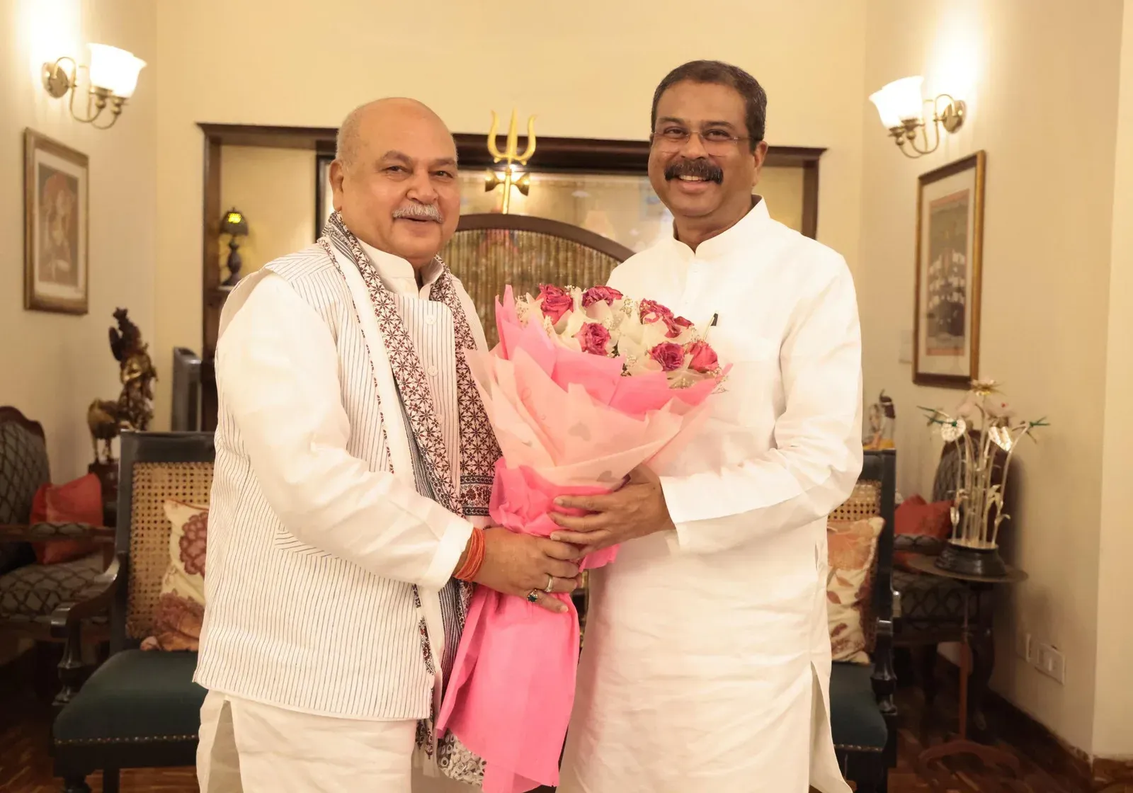 Pradhan Meets MP Speaker Tomar in Courtesy Call