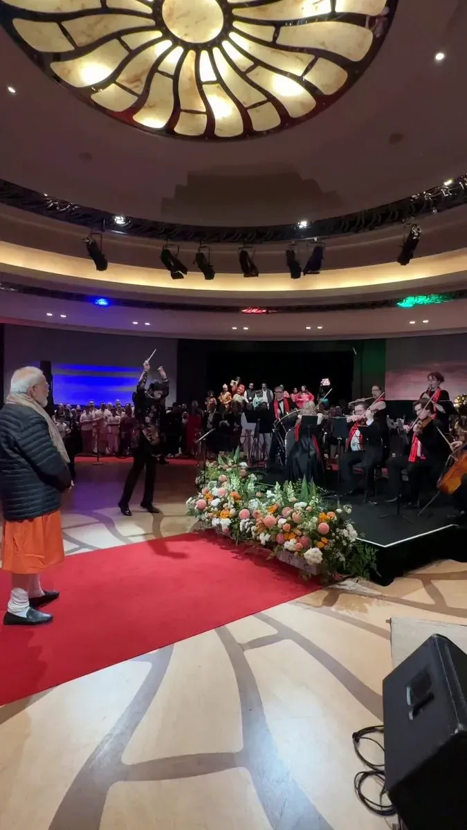 Pradhan Receives Musical Welcome in Australia