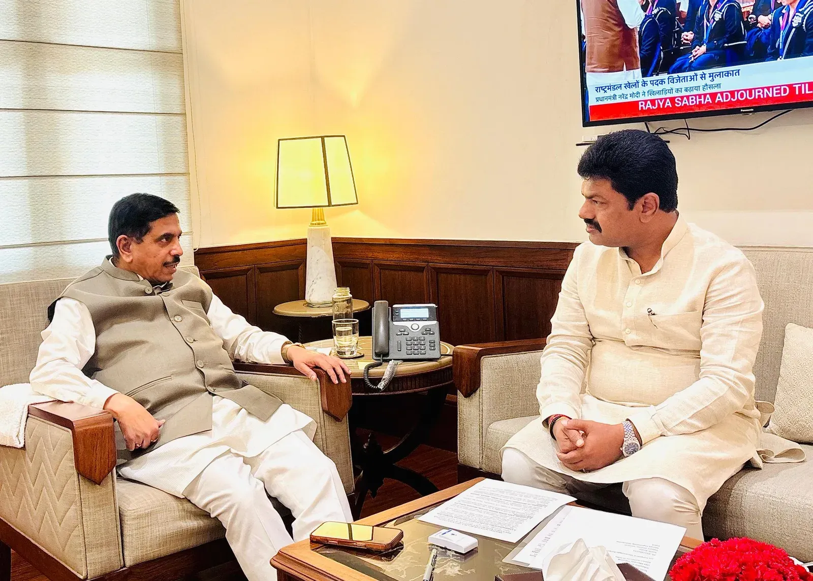 Pralhad Joshi receives Shivamogga MP B.Y. Raghavendra at Parliament office