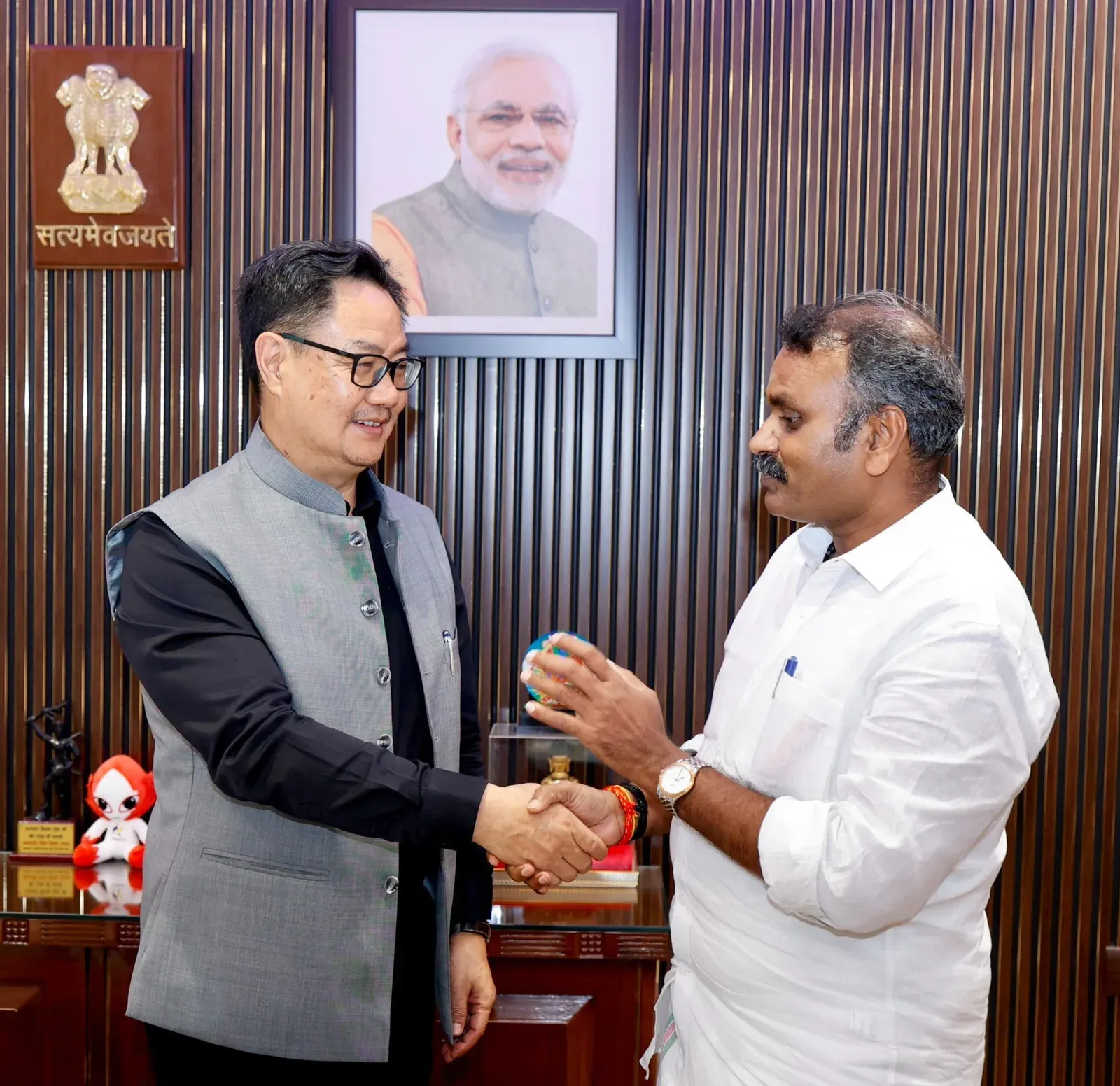 Rijiju meets MoS Murugan at New Delhi residence