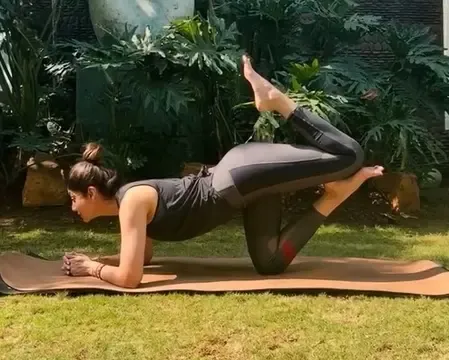 How Does Shilpa Shetty Believe Vyaghrasana Enhances Balance and Strength?