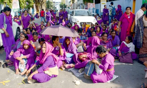 Protest by ASHA volunteers at Swasthya Bhavan in Kolkata