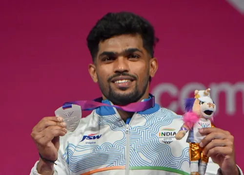 रजत पदक के साथ राजा मुथुपांडी — ग्लासगो 2026