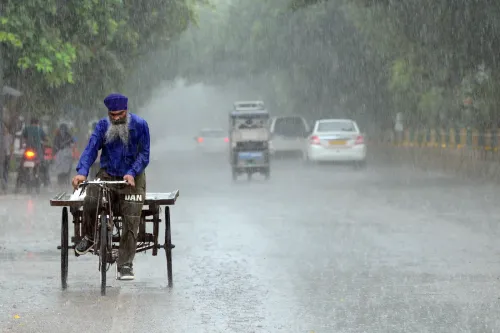 Jalandhar: People brave heavy rain amid downpour