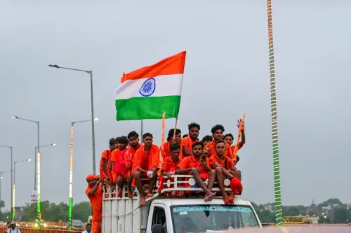 Prayagraj: Kanwariyas carry Ganga water during Shravan