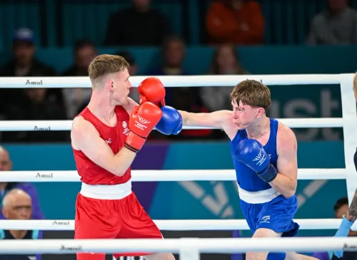 Glasgow: Nick Devlin competes against Finbar O'Sullivan in Commonwealth Games boxing