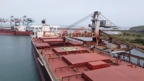 How is Adani Ports Collaborating with NMDC and Vale Brazil to Enhance Iron Ore Development?