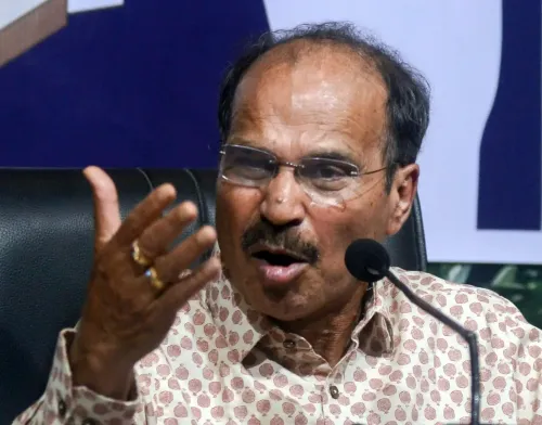 How did Adhir Chowdhury address President Murmu regarding harassment of Bengali workers?