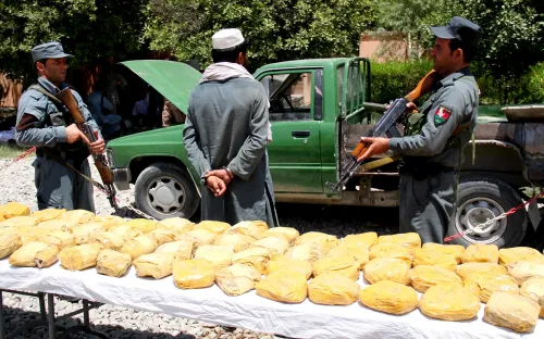 Did Afghan police just seize 551 kg of illegal drugs and arrest two smugglers?