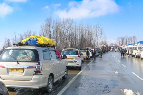 Has traffic on the Srinagar-Jammu highway been restored after heavy snowfall?