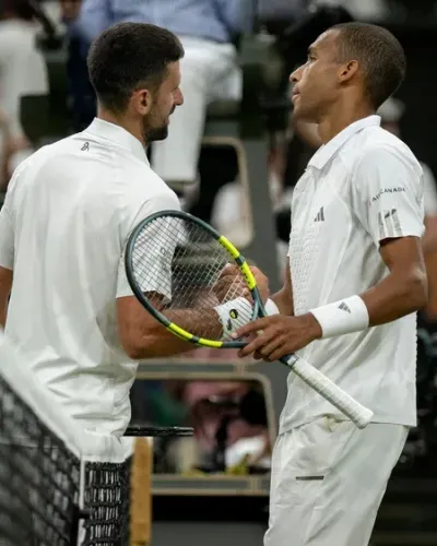 Auger-Aliassime falls to Djokovic in record Wimbledon QF thriller