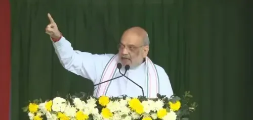 Amit Shah Critiques Congress at Assam Rally; Highlights BJP's Development and Peace Efforts