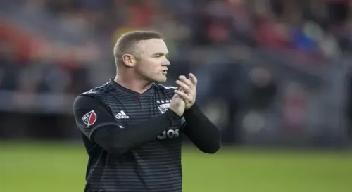 Wayne Rooney Calls for Stronger Arsenal Fan Support Amid Title Race Challenges