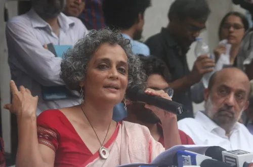 Why has Arundhati Roy's book been declared ‘forfeited’ by the J&K government?