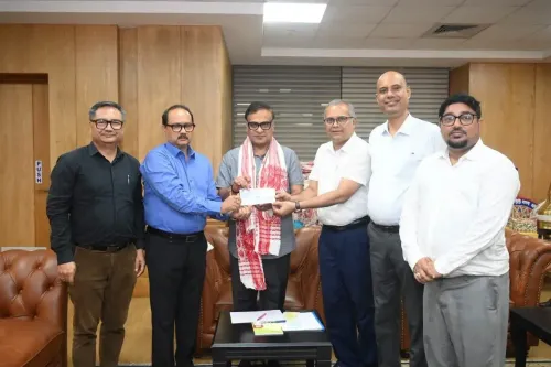Assam CM Himanta thanks Gauhati University, Adarsha Vidyalaya for flood relief donations