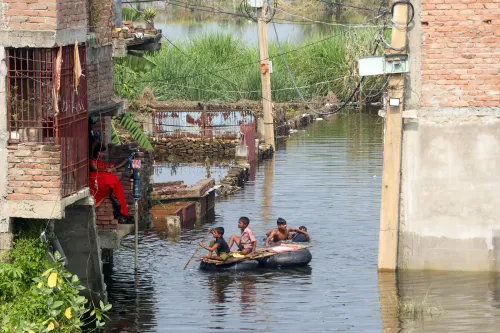 Bihar floods 2025: Viral video of father carrying son to school sparks outrage