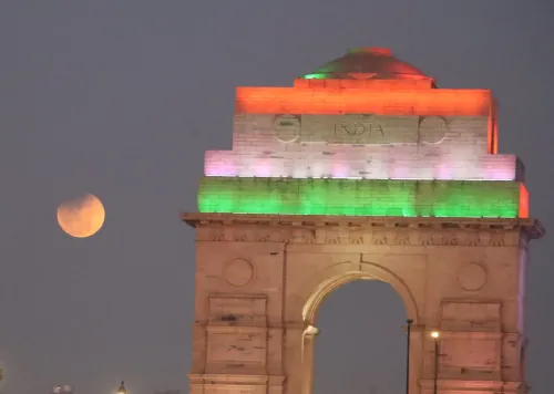 Crimson Moon Above India Gate During Lunar Eclipse in New Delhi