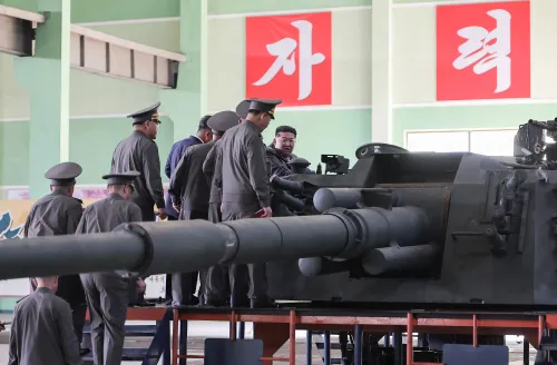 N.K. leader inspects munitions factory
