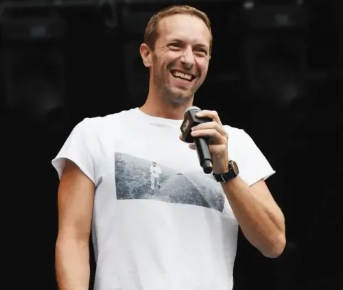 Did Chris Martin Leave Newlyweds Speechless with a Surprise Performance?