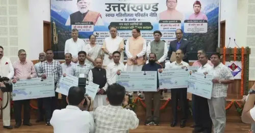 CM Dhami Distributes Vehicle Owner Grants in Dehradun