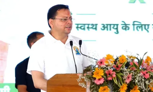 CM Dhami Leads Yoga Day Celebrations in Banbasa