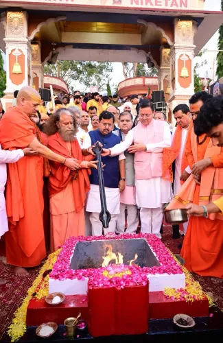 CM Dhami Offers Ganga Aarti at Rishikesh with BJP Chief