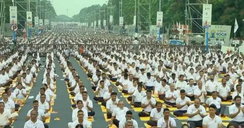 CM Dhami Shares Live Update of PM Modi at 12th International Yoga Day