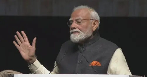 CM Dhami shares PM Modi's live community event in Auckland