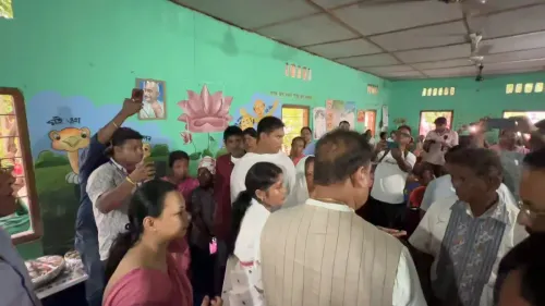 CM Himanta visits Sonari flood relief camp, hands out school uniforms