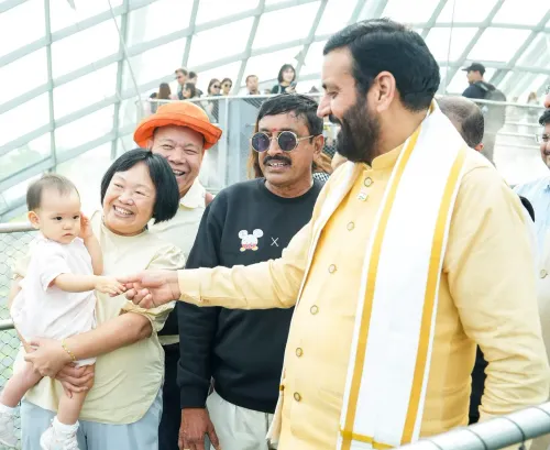 CM Nayab Saini Meets Indian Tourists in Singapore