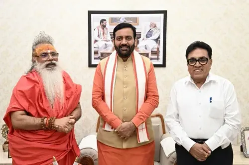 CM Saini Meets Spiritual Leader Swami Dharmadev at Chandigarh Residence