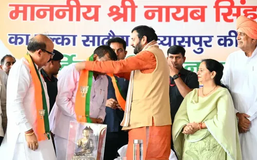 CM Saini Welcomes Rishipal, Supporters into BJP from Sadhaura