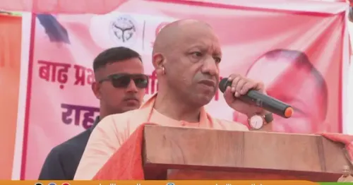 CM Yogi visits Kushinagar flood victims, distributes relief