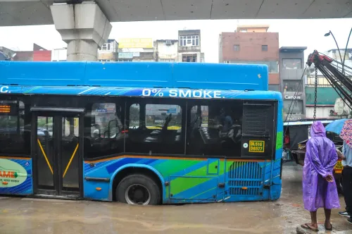 New Delhi: DTC bus gets stuck after road caves in