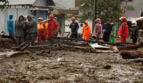 What is the rising death toll from Indonesia's flash floods?