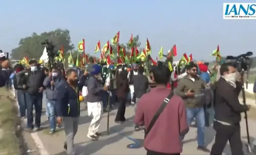 Farmers' 'Delhi Chalo' March Halted After Injuries from Tear Gas Shelling