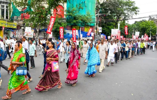 Kolkata: SUCI(C) activists hold protest rally