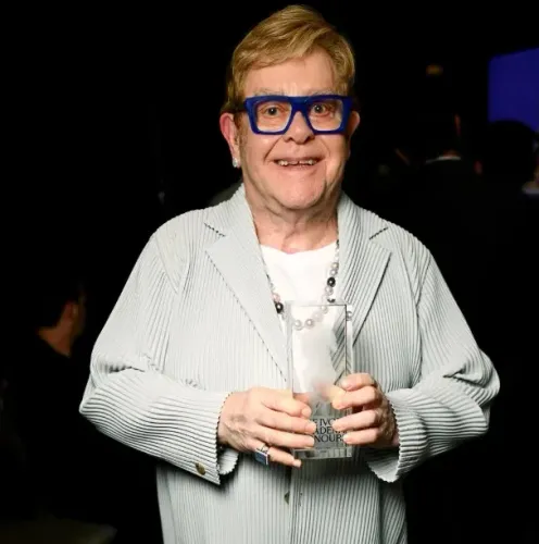 Elton John sings 'Your Song' at Dua Lipa and Callum Turner's Italy wedding