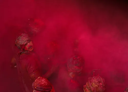 Mathura: Participants honor Lathmar Holi at Shri Nand Baba Temple in Nandgaon